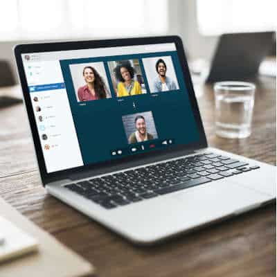 Laptop displaying a video conference